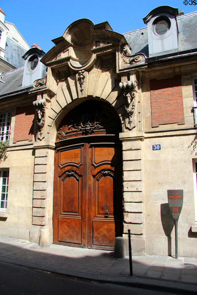 Door of Hôtel d'Almeras (1612) (30 Rue des Francs Bourgeois). Paris, France.