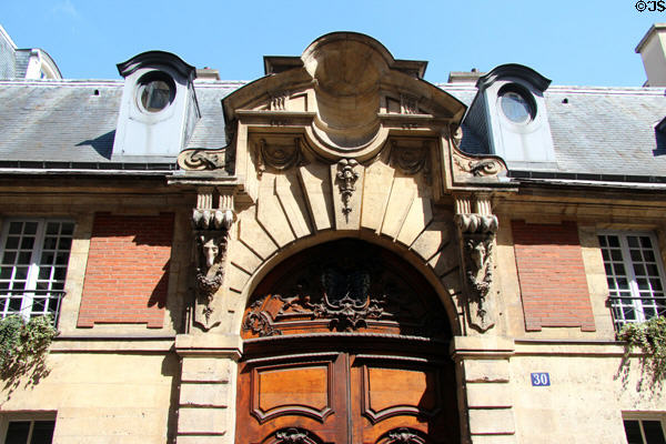 Door of Hôtel d'Almeras (1612) (30 Rue des Francs Bourgeois). Paris, France.