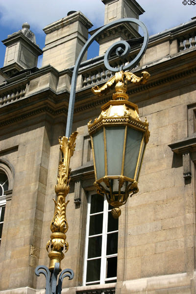 Light standard in Cour du Mai (c1786) of Palais de Justice. Paris, France.