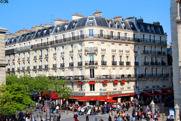 Apartment & commercial building on Rue d'Arcole beside Notre Dame Cathedral on Isle de la Cité. Paris, France.