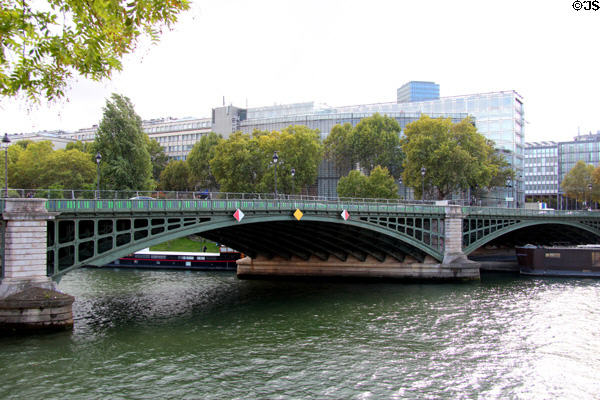 Pont de Sully (1800s) cast-iron arch bridge with Arab World Institute beyond. Paris, France.