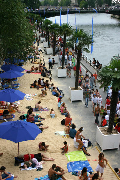 Artificial sandy beach on banks of River Seine. Paris, France.