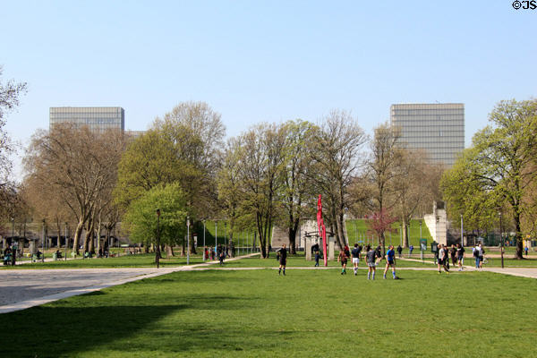 lawn with four towers of National Library across the Seine. Paris, France.