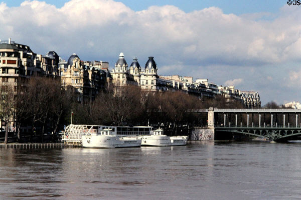Turreted residences along Seine near Pont de Bir-Hakeim. Paris, France.