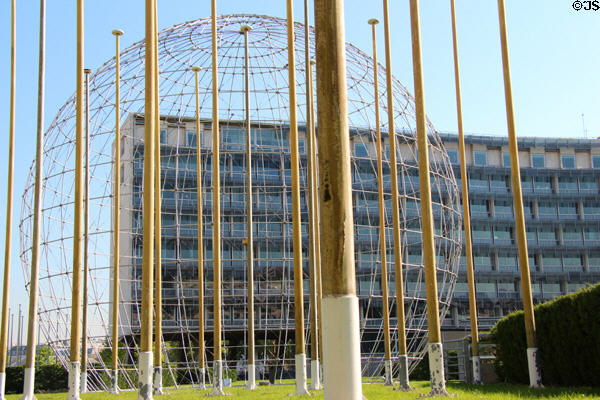 Array of flag poles & wire globe at UNESCO Headquarters (1958). Paris, France.