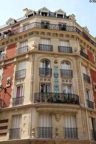 Residential building with tiles in 16th arrondissement. Paris, France.