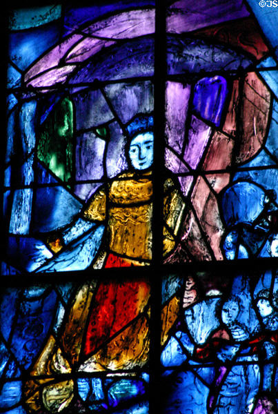 Stained glass detail of King St Louis delivering justice like King David by Marc Chagall in Cathedral. Reims, France.