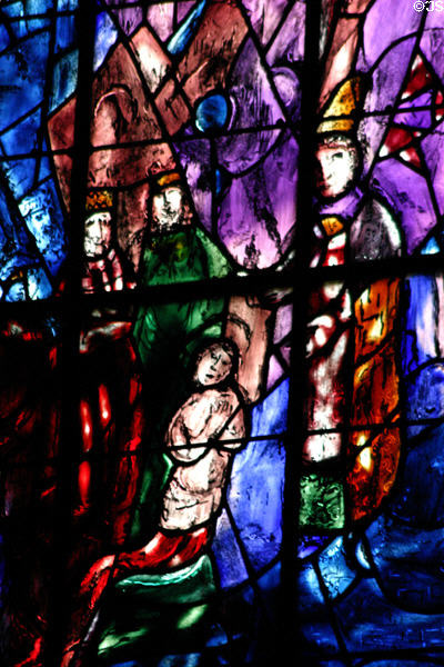 Stained glass detail of Coronation of young Saint Louis by Marc Chagall in Cathedral. Reims, France.
