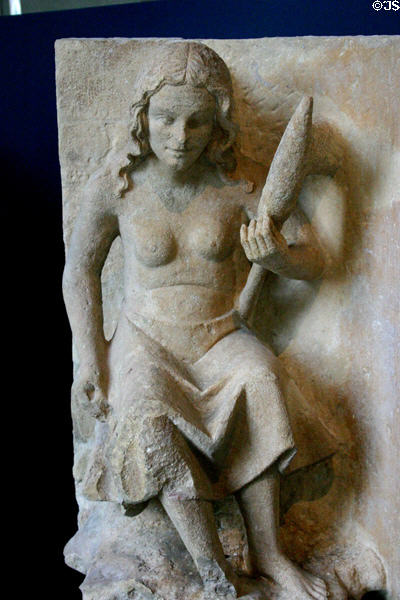 Statues of Eve carrying a spindle at Tau Palace Museum. Reims, France.