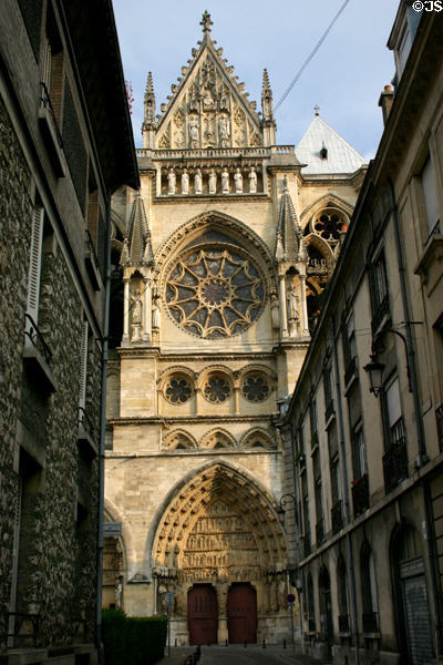 Cathedral seen through narrow streets. Reims, France.