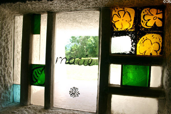 Colored Marie windows of Notre Dame-du-Haut Chapel. Ronchamp, France.