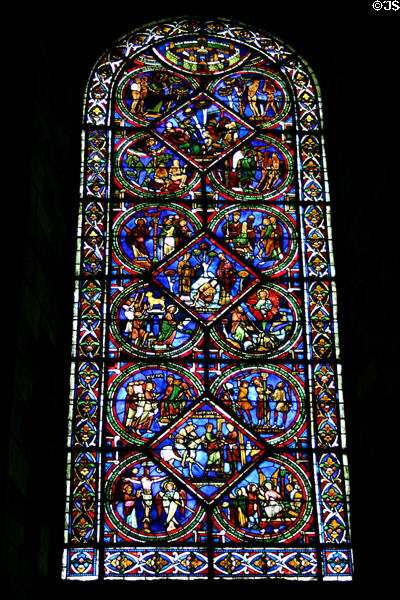 Stained glass window of St. Stephen's Cathedral with Biblical stories. Sens, France.