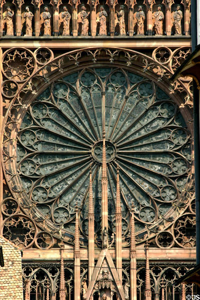 Outside of rose window over central door of Cathedral. Strasbourg, France.