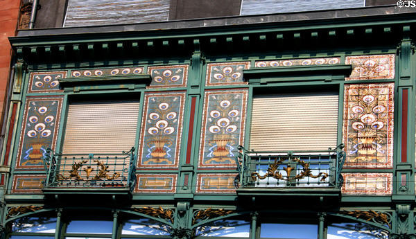 Windows with peacock feather motif on Art Nouveau building on rue des Grandes Arcades. Strasbourg, France.