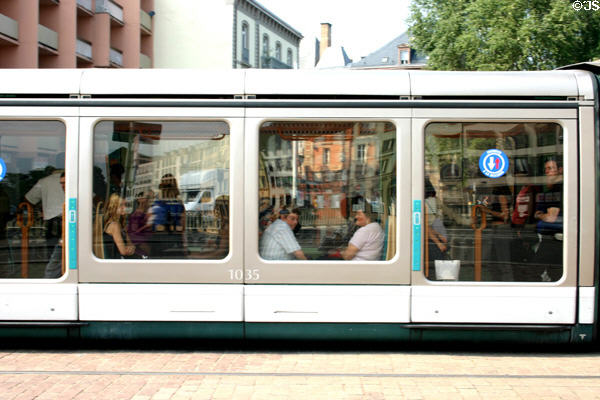 Passengers in modern streetcar. Strasbourg, France.
