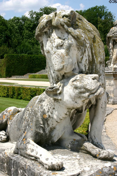 Lion & lioness sculpture in Vaux-le-Vicomte garden. Melun, France.