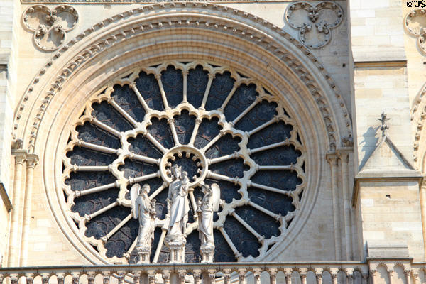 Rose window exterior of Notre Dame Cathedral. Paris, France.