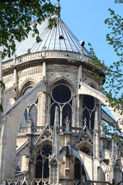 Gothic rear structure of Notre Dame Cathedral with flying buttresses. Paris, France.