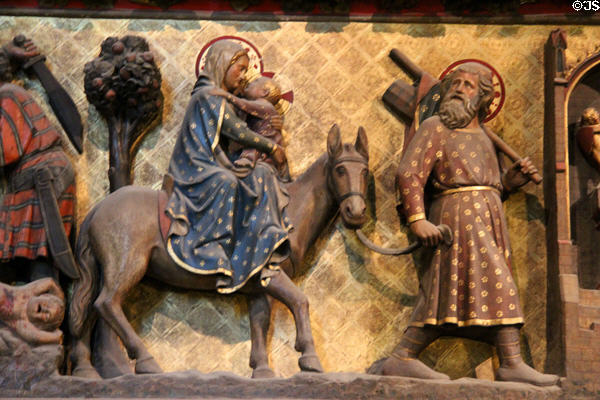 Flight into Egypt on carved stone chancel screen (14thC) in Notre Dame Cathedral. Paris, France.
