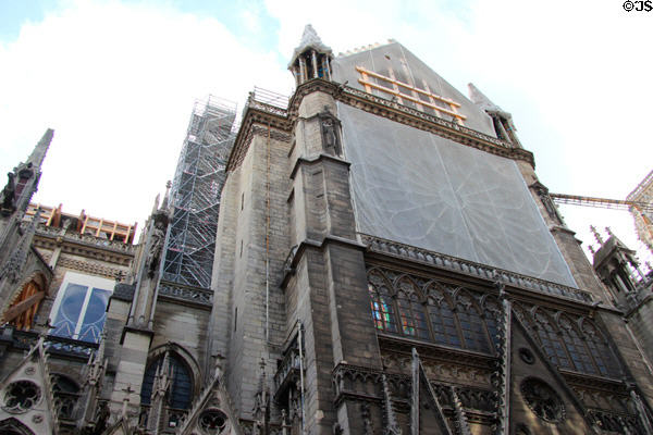 Northern rose window of Notre Dame Cathedral being protected after fire of 2019. Paris, France.