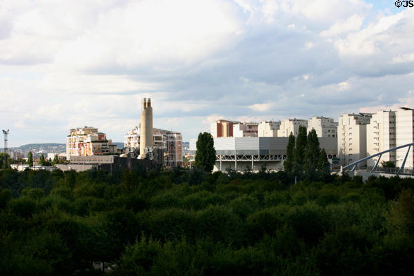 Cemetery of Neuilly with Courbevoie residential suburbs beyond seen from La Défense. Paris, France.
