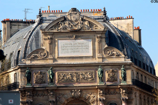 St-Michel Fountain dedication plaque (1860) noting construction by city of Paris in reign of Emperor Napoleon III with chimney pots above & frieze level with statues of cardinal virtues below. Paris, France.