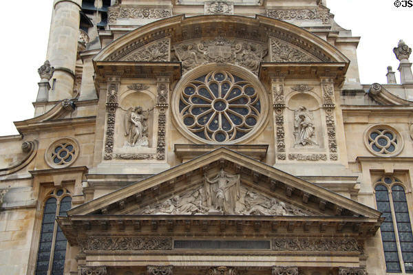 Rose window in post-Gothic facade on St-Étienne-du-Mont church. Paris, France.