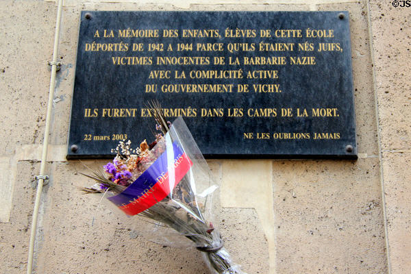 Memorial plaque to Jewish children picked up by Nazis & complicit French government & sent to extermination camps during 1942-4 on Sorbonne building. Paris, France.