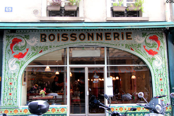 Boissonnerie bar with mosaic shop front of former fish monger on rue de Seine. Paris, France.