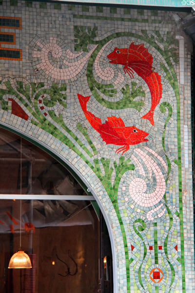 Mosaic detail of Boissonnerie shop front on rue de Seine. Paris, France.