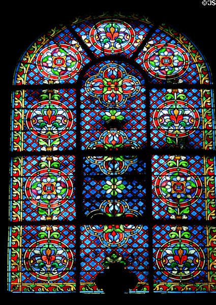 Early-style stained glass window at St-Germain-des-Prés. Paris, France.