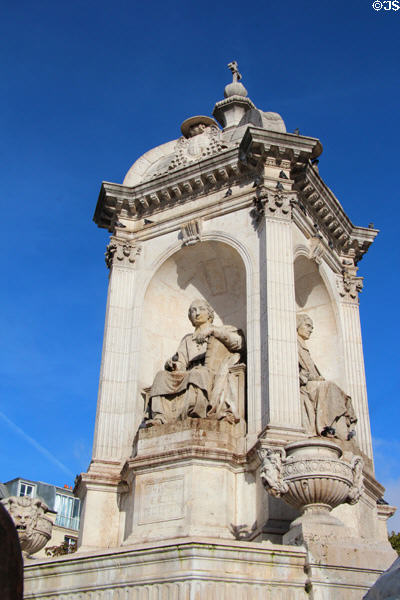 Bishop statues atop St-Sulpice fountain. Paris, France.