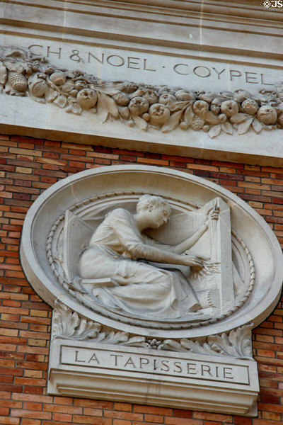 Relief roundel features weaving aspect of tapestry making c1912 by Jean Hugues at Gobelins Manufactory building. Paris, France.