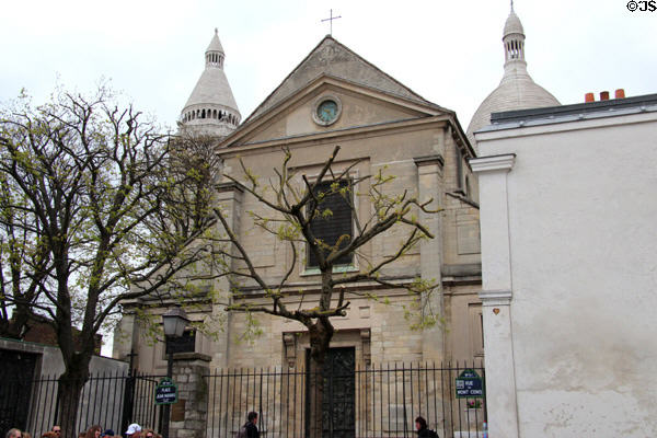 Paroisse Saint-Pierre de Montmartre (12thC) with domes of Basilica beyond at Montmartre. Paris, France.