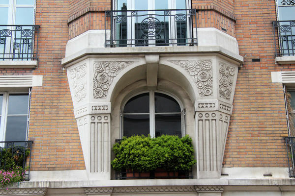 Window surround carvings of 71 Rue Lepic on Montmartre. Paris, France.