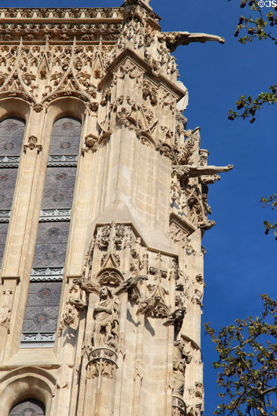 Upper level Gothic-style details of Tour St Jacques. Paris, France.