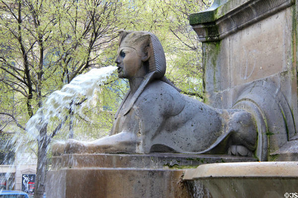 Sphinx spouting water from Fontaine du Palmier at Place du Châtelet. Paris, France.