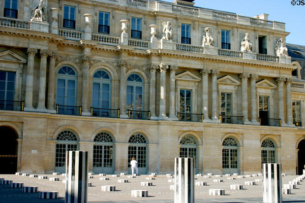 Daniel Buren's Columns art installation (c1985) in before central section of Palais Royale. Paris, France.
