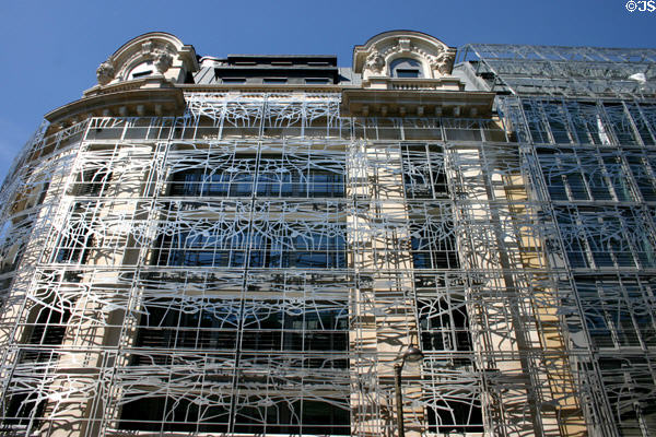 Silver Net architectural screen on French Ministry of Culture (Rue Saint Honoré at Croix des Petits Champs) which unifies buildings from different eras. Paris, France.
