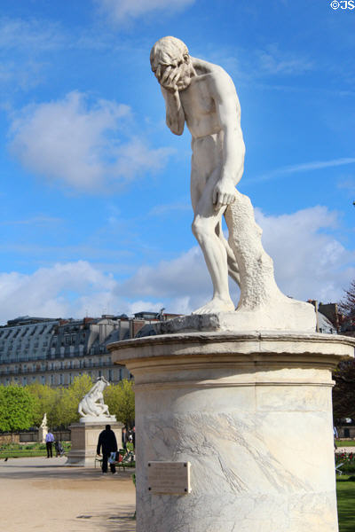 Cain coming from killing his brother Abel marble sculpture (1896) by Henri Vidal in Tuileries Garden. Paris, France.