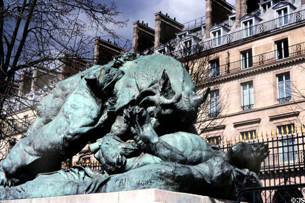 Rhinoceros Attacked by a Tiger bronze sculpture (1884) by Auguste Nicolas Cain in Tuileries Garden. Paris, France.