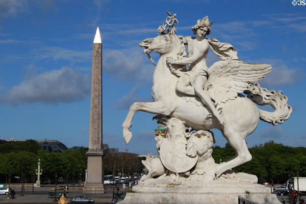 Mercury riding Pegasus sculpture (1702) by Antoine Coysevox with Obelisk beyond at Place de la Concorde. Paris, France.