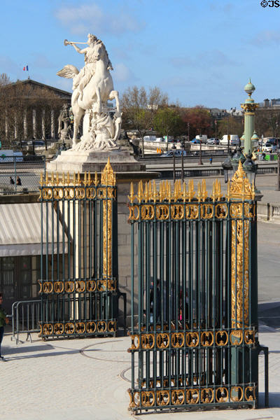 Fame riding Pegasus sculpture (1702) by Antoine Coysevox beside entrance gates to Tuileries Garden at Place de la Concorde. Paris, France.