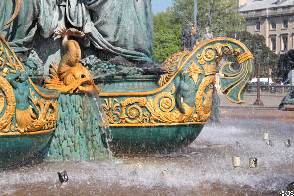 Detail of dolphin & boat prow on Fountain of Rivers (1840) by Jacques Ignace Hittorff in northern position on Place de la Concorde. Paris, France.