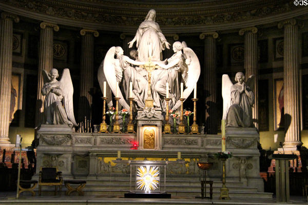 Altar with the statue of Mary Magdalene at Église de la Madeleine. Paris, France.