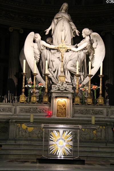 Altar with the statue of Mary Magdalene at Église de la Madeleine. Paris, France.