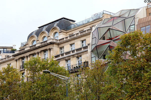Mix of traditional & modern building facades on Champs Elysees. Paris, France.