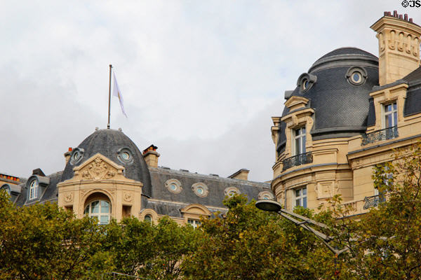 Domed Beaux-Arts buildings on Champs Elysees. Paris, France.