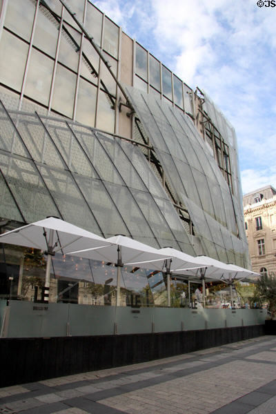 Drugstore Publicis modern glass facade detail at Champs Elysees. Paris, France.