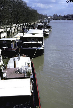 House barges on a flooded Seine River. Paris, France.